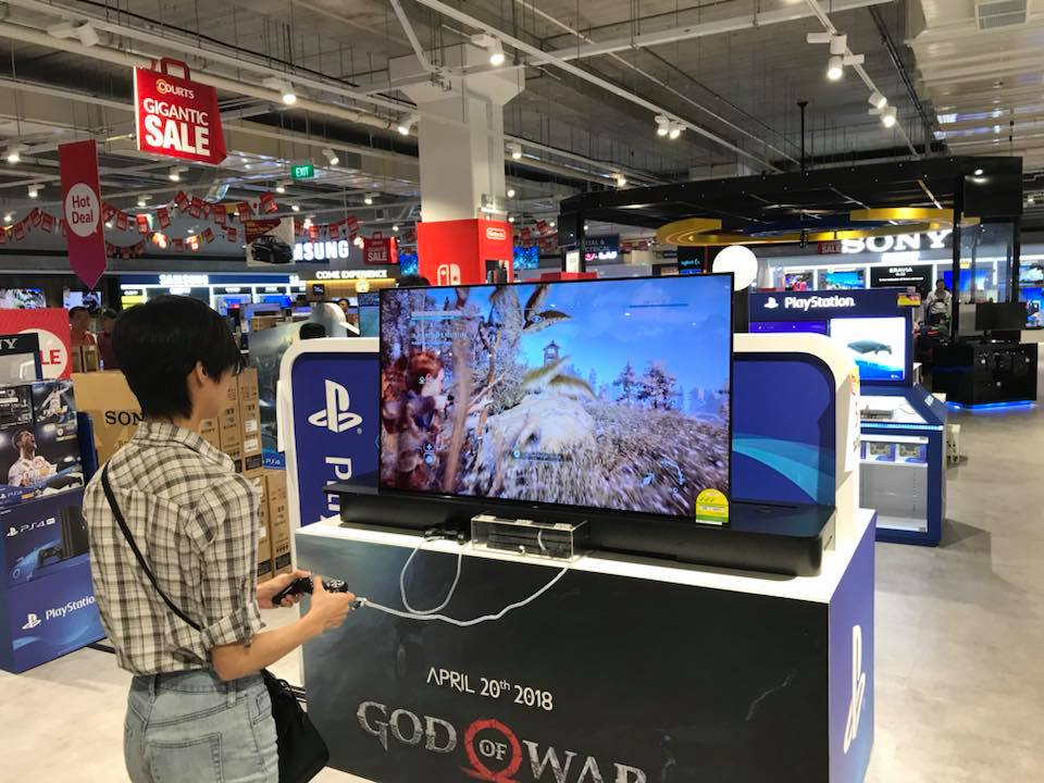 Gamers in Singapore - playing games on display TV